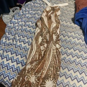 beautiful gold and white dress, elegant and shapes body well